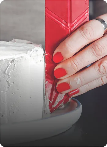 Using the spoon as a cake scraper